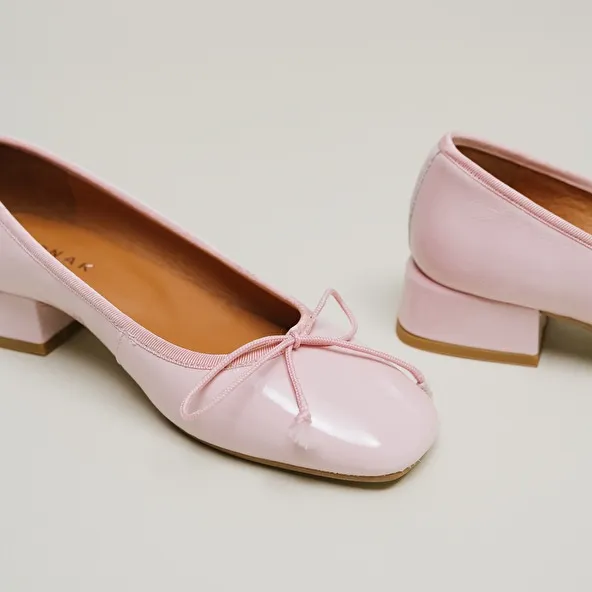 Ballerinas with heels in pink pleated patent