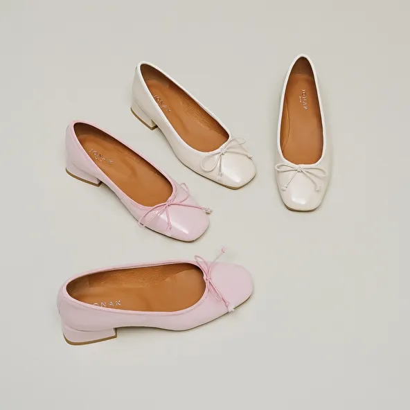 Ballerinas with heels in pink pleated patent