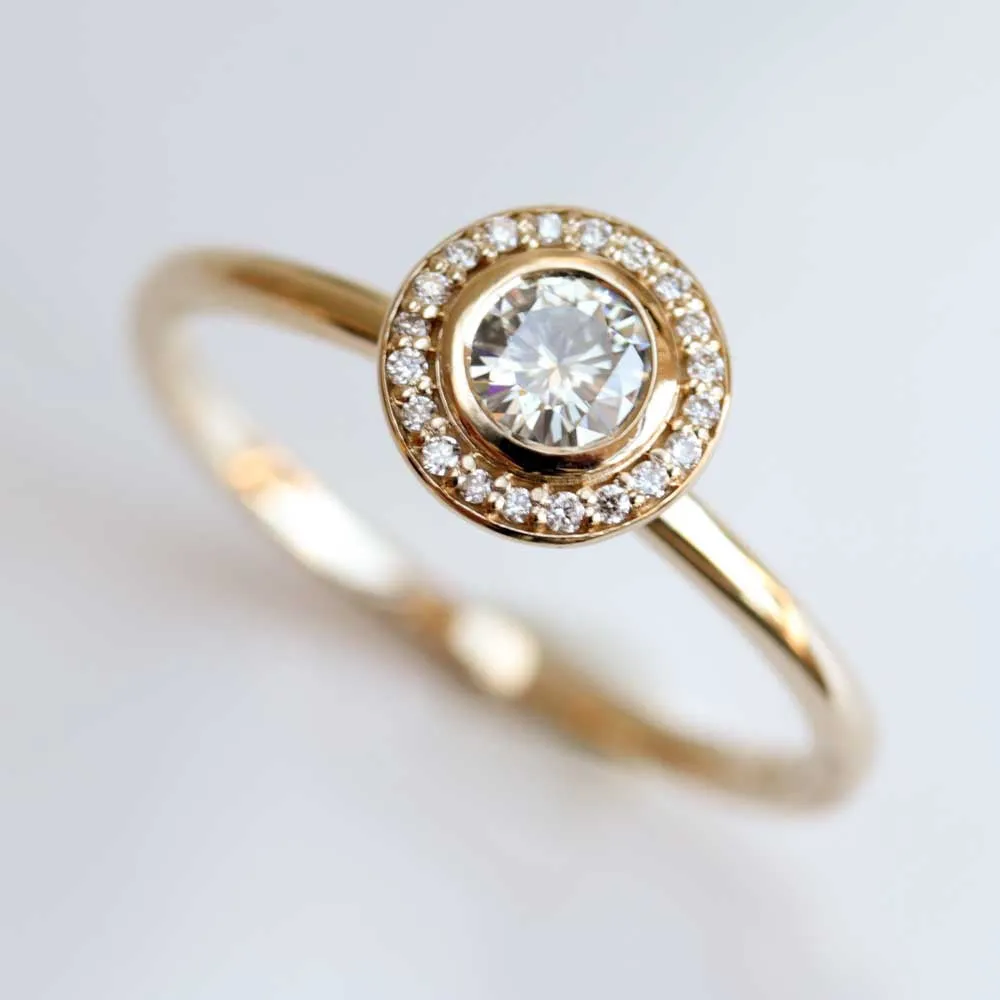 Bezel-set Halo Solitaire Engagement Ring