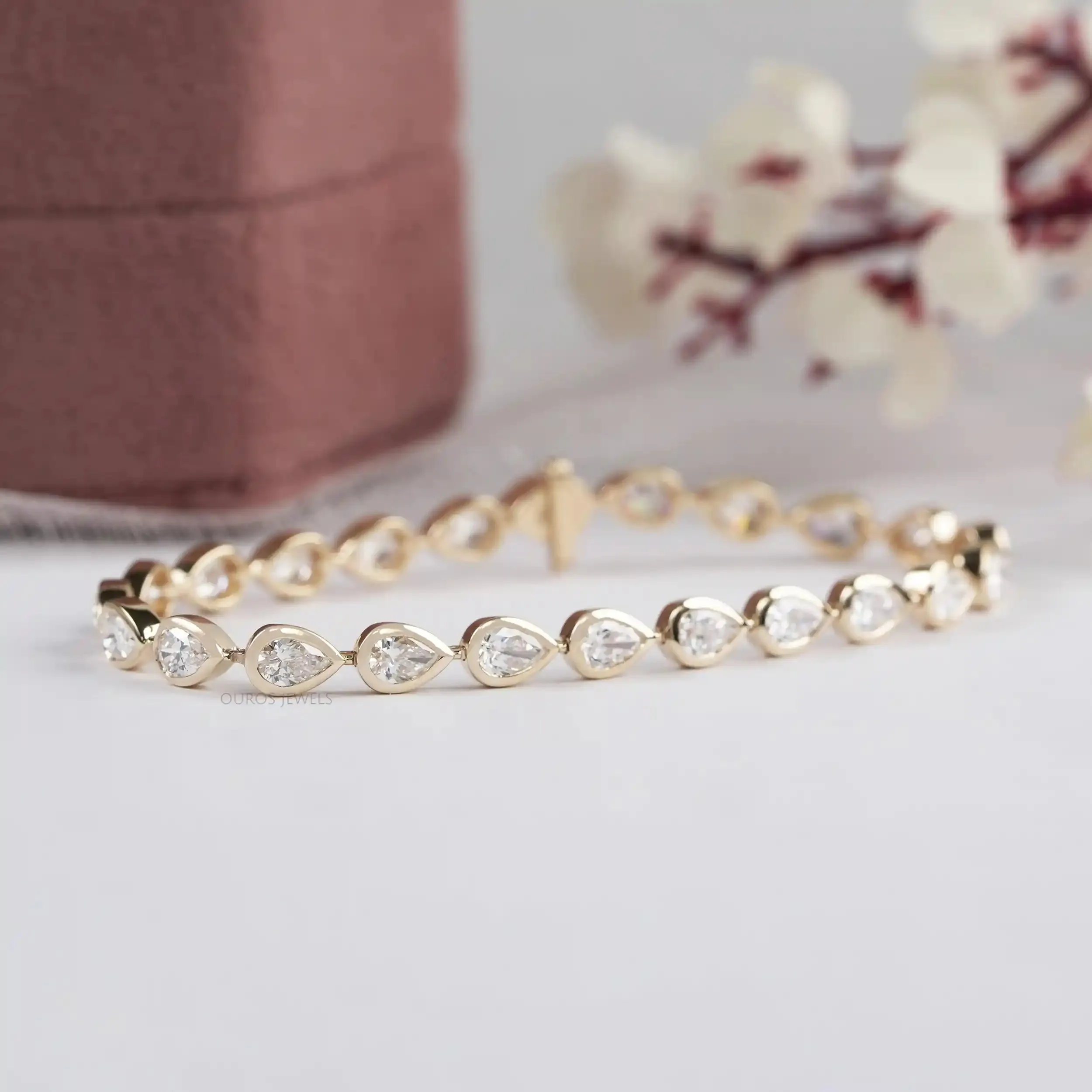 Pear Cut Bezel Set Tennis Bracelet in East West Style