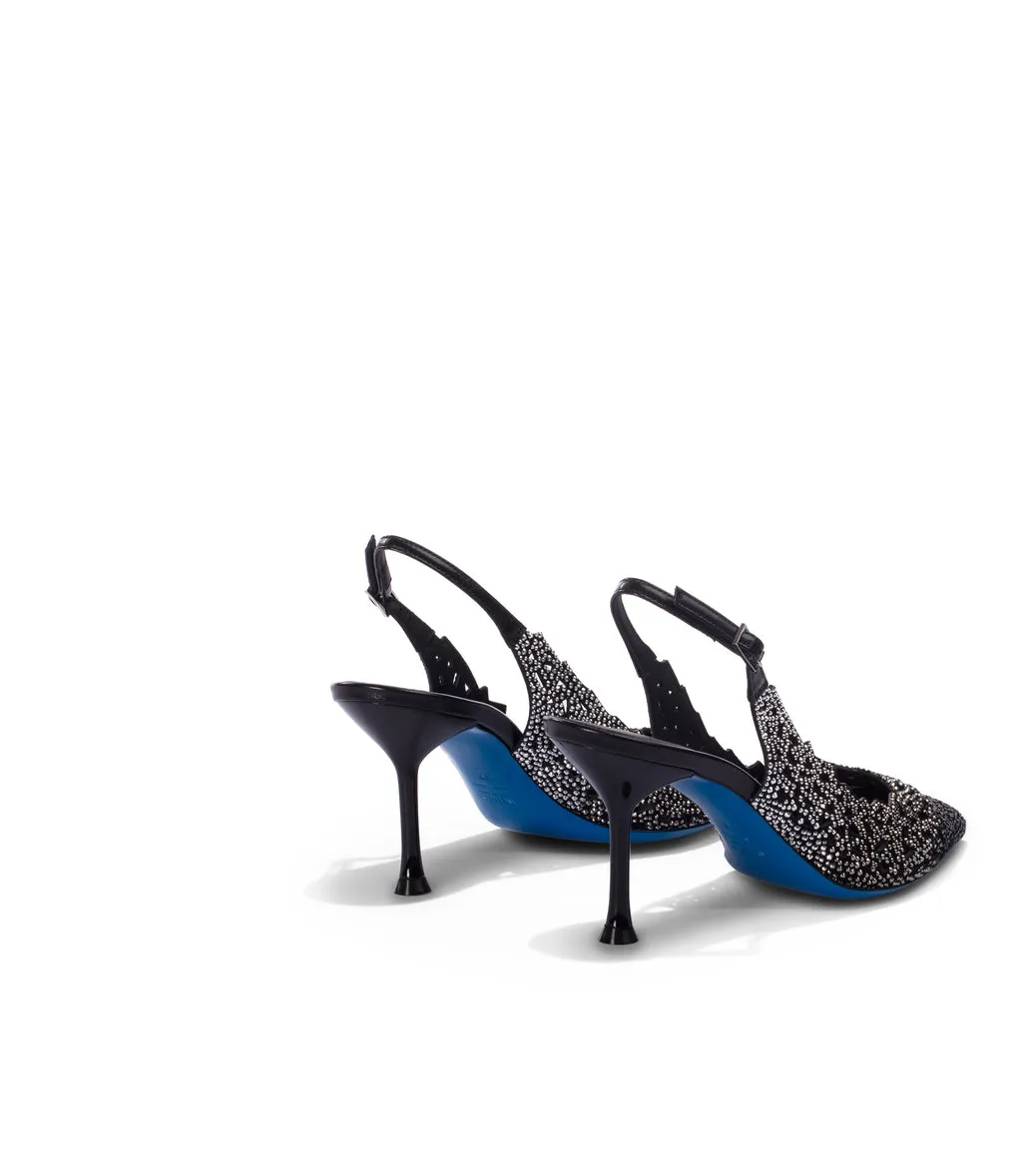 Black suede pumps with crystal embellishments and laser-cut details.