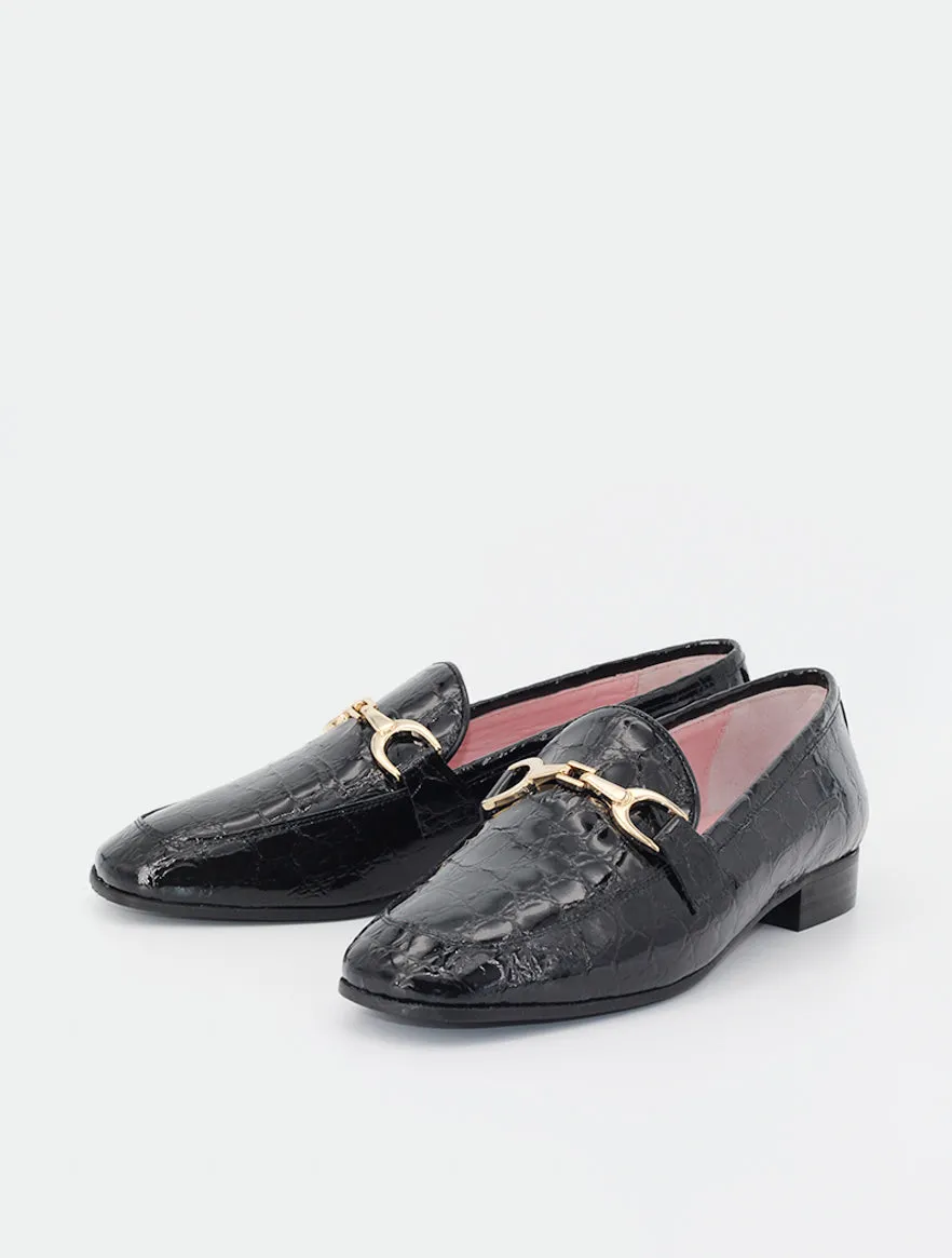 Black patent leather Giverny loafers.