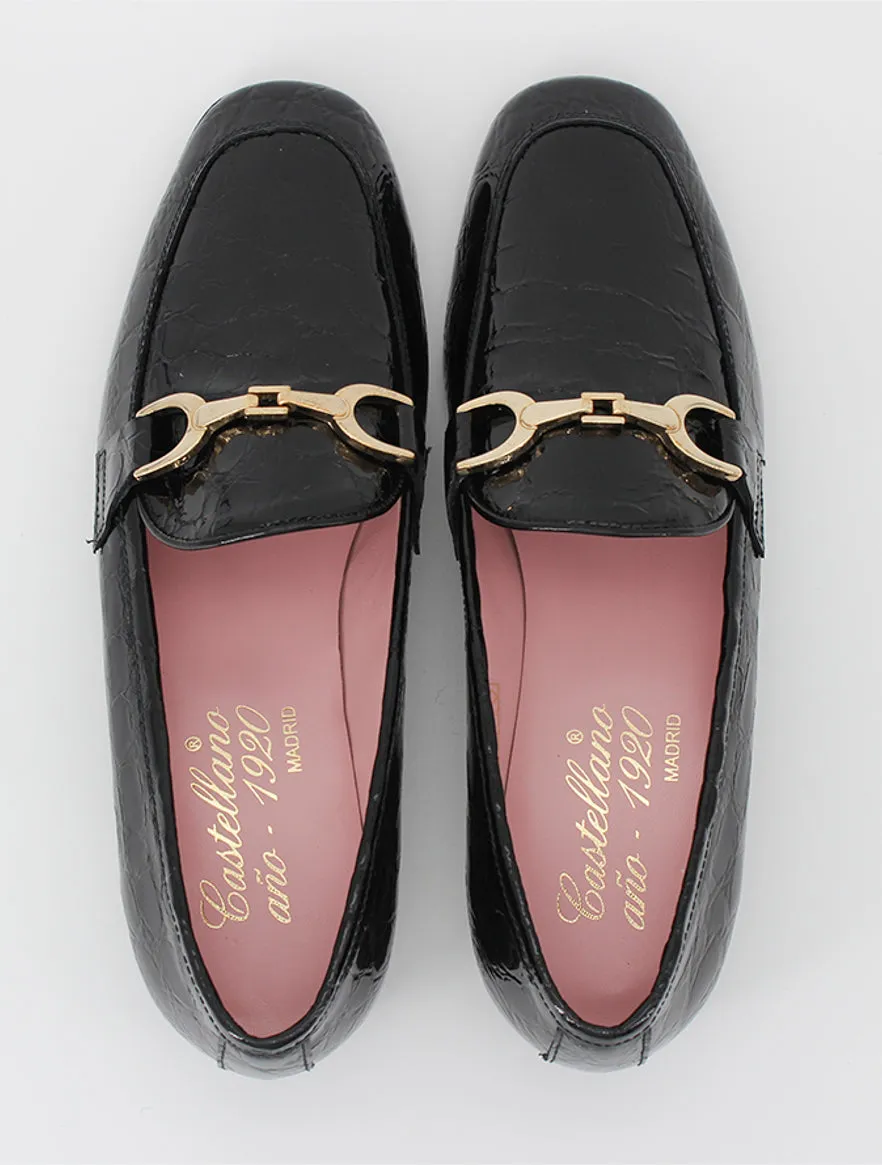 Black patent leather Giverny loafers.