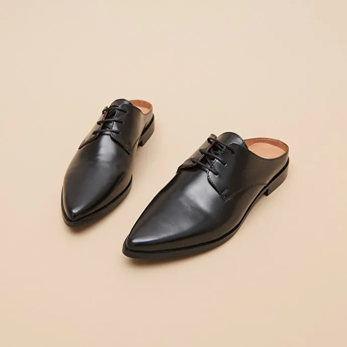 Mules with laces in black glazed leather