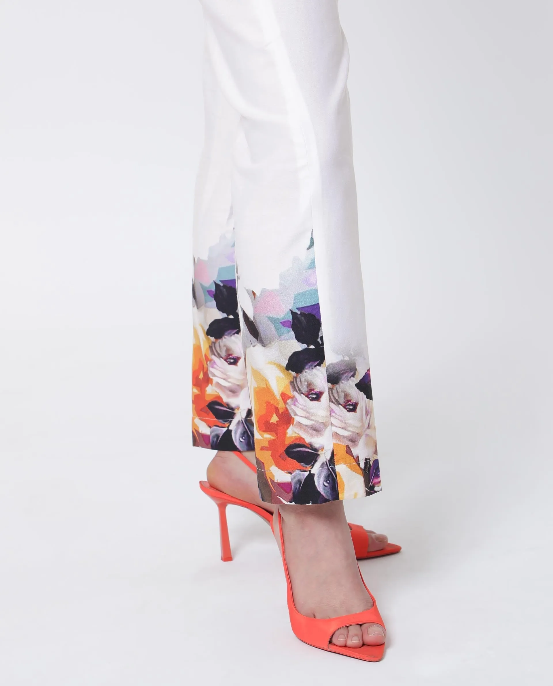 Rareism Women Weigen White Cotton Fabric Relaxed Fit Floral Print Ankle Length Trousers