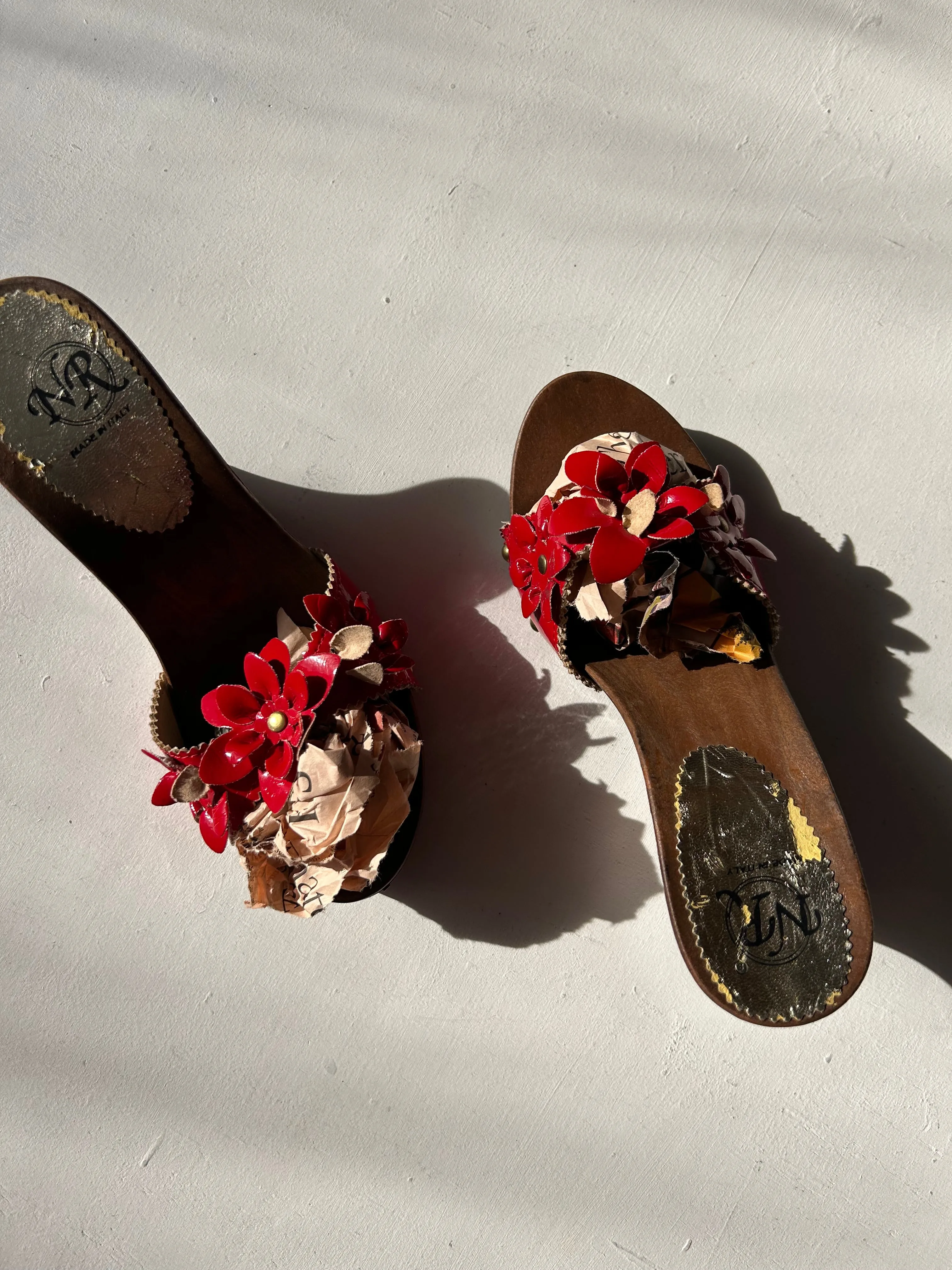 red flowers appliquée mules on wooden platforms in size 37