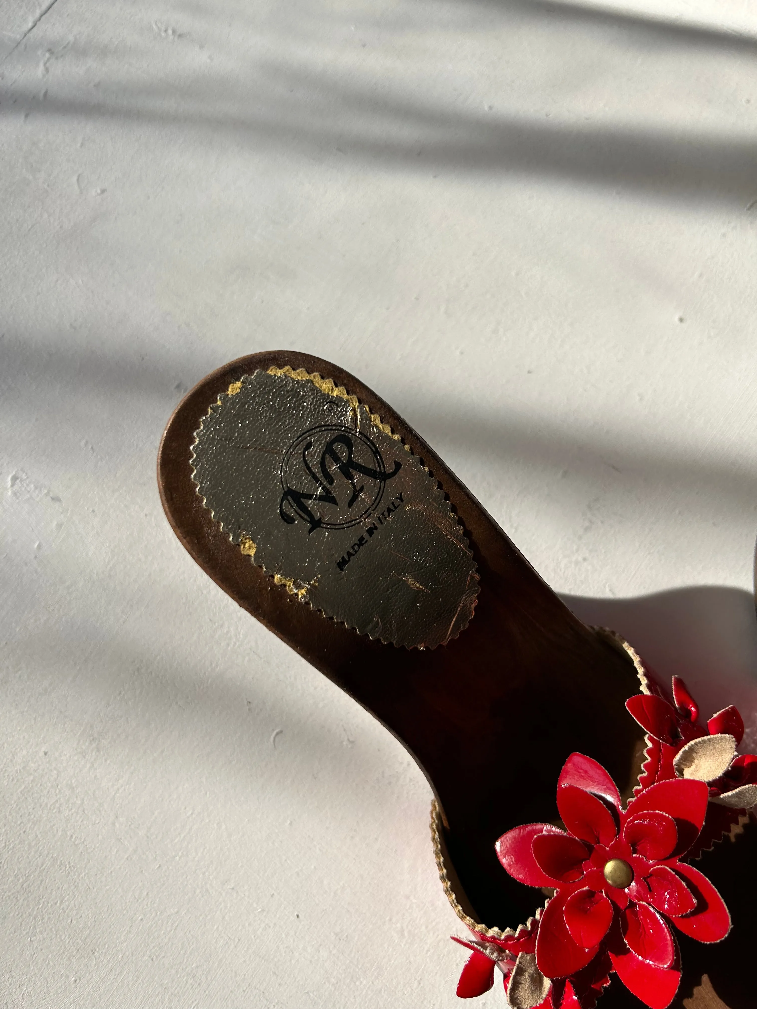 red flowers appliquée mules on wooden platforms in size 37