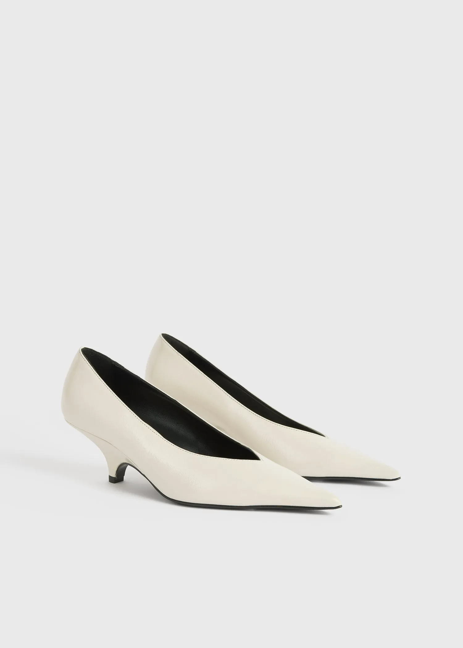 Wedge-heel Naplack pumps bleached sand