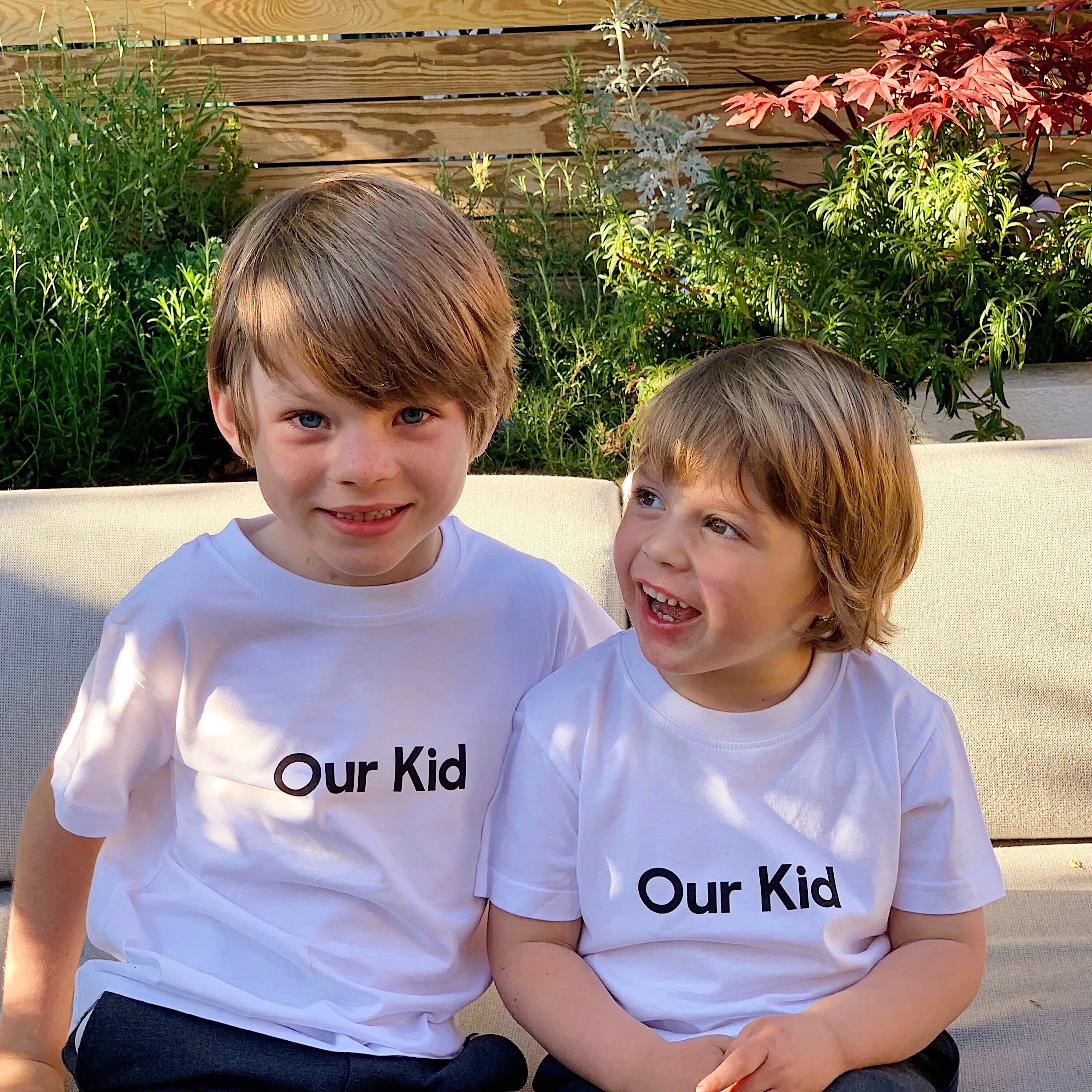 White Kids T-Shirt with Slogan - OUR KID